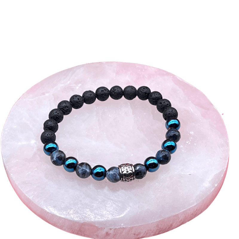 Hematite Lava Stone Alight Healing bracelet on a sea of selenite